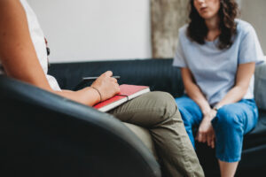 A person talks to a therapist about relapse.